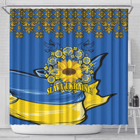 Blue shower curtain with ornate gold border, sunflower-and-wing emblem, "SLAVA UKRAINE!"