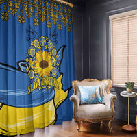 Blue and yellow window curtain panel with sunflower and peace-style figure centerpiece