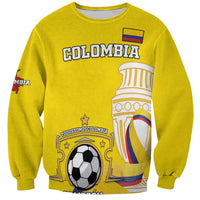 Yellow football sweatshirt with Colombia graphic crest on front, long sleeves