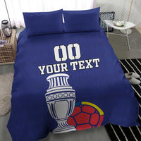 Blue football bedding set with duvet and two pillowcases, 'DO YOUR TEXT' trophy and soccer ball