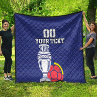 Large blue quilt spread outdoors with 00, YOUR TEXT, trophy and soccer ball graphic
