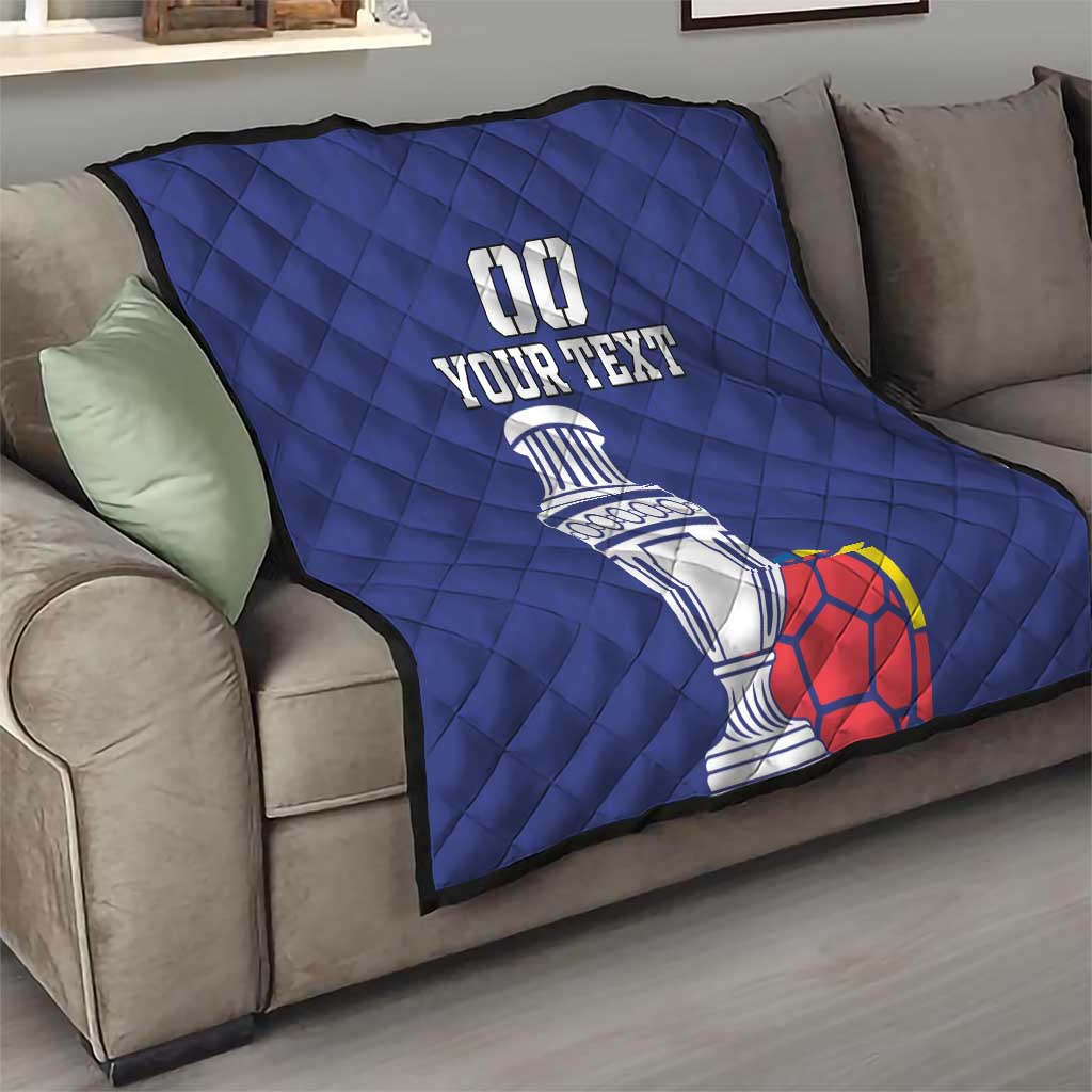 Blue quilt on sofa with 00, YOUR TEXT, trophy and soccer ball graphic
