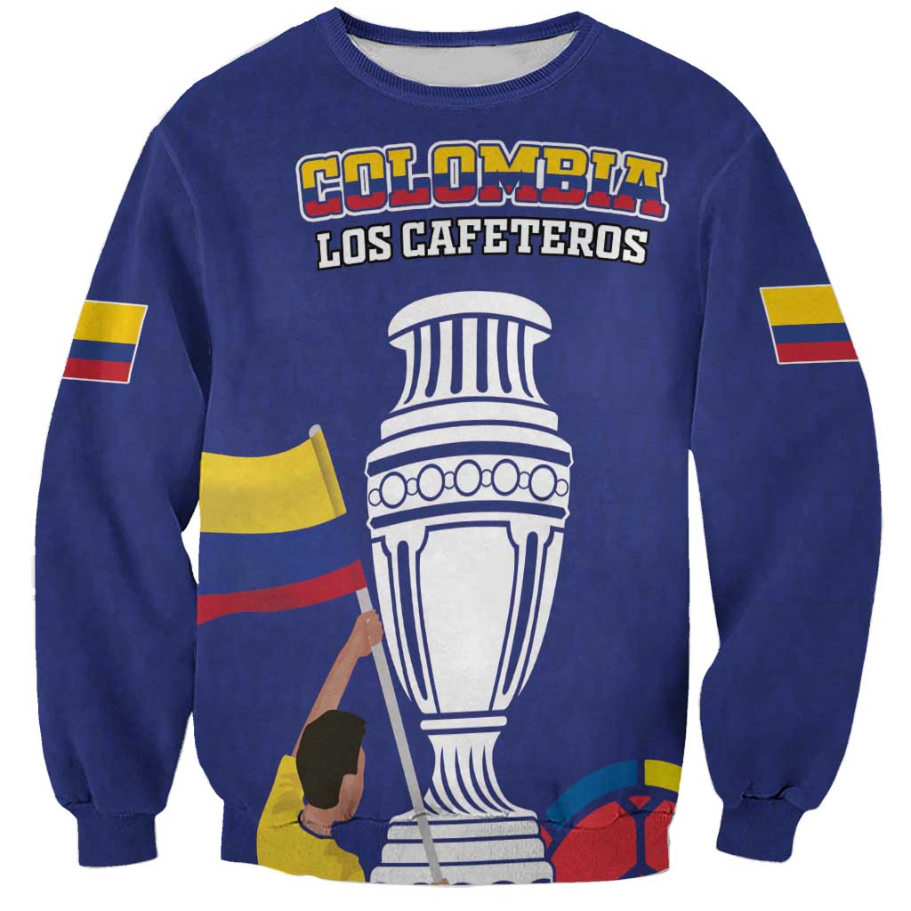 Blue football sweatshirt with 'COLOMBIA' text, trophy graphic, and flag stripe sleeves