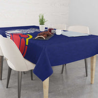 Blue football tablecloth on dining table with chairs and cup-and-ball graphics