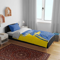 Blue and yellow duvet cover bedding set with two pillowcases, crest and dove artwork