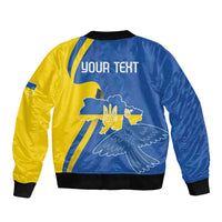Blue/yellow bomber jacket, black ribbed hem, Your Text print with dove and trident graphic