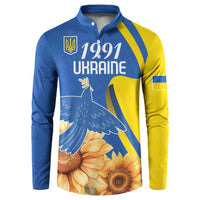Blue and yellow button-up sweatshirt with front “1991 Ukraine” dove and sunflower print