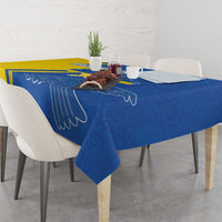 Blue tablecloth with peace dove wing print and yellow stripe