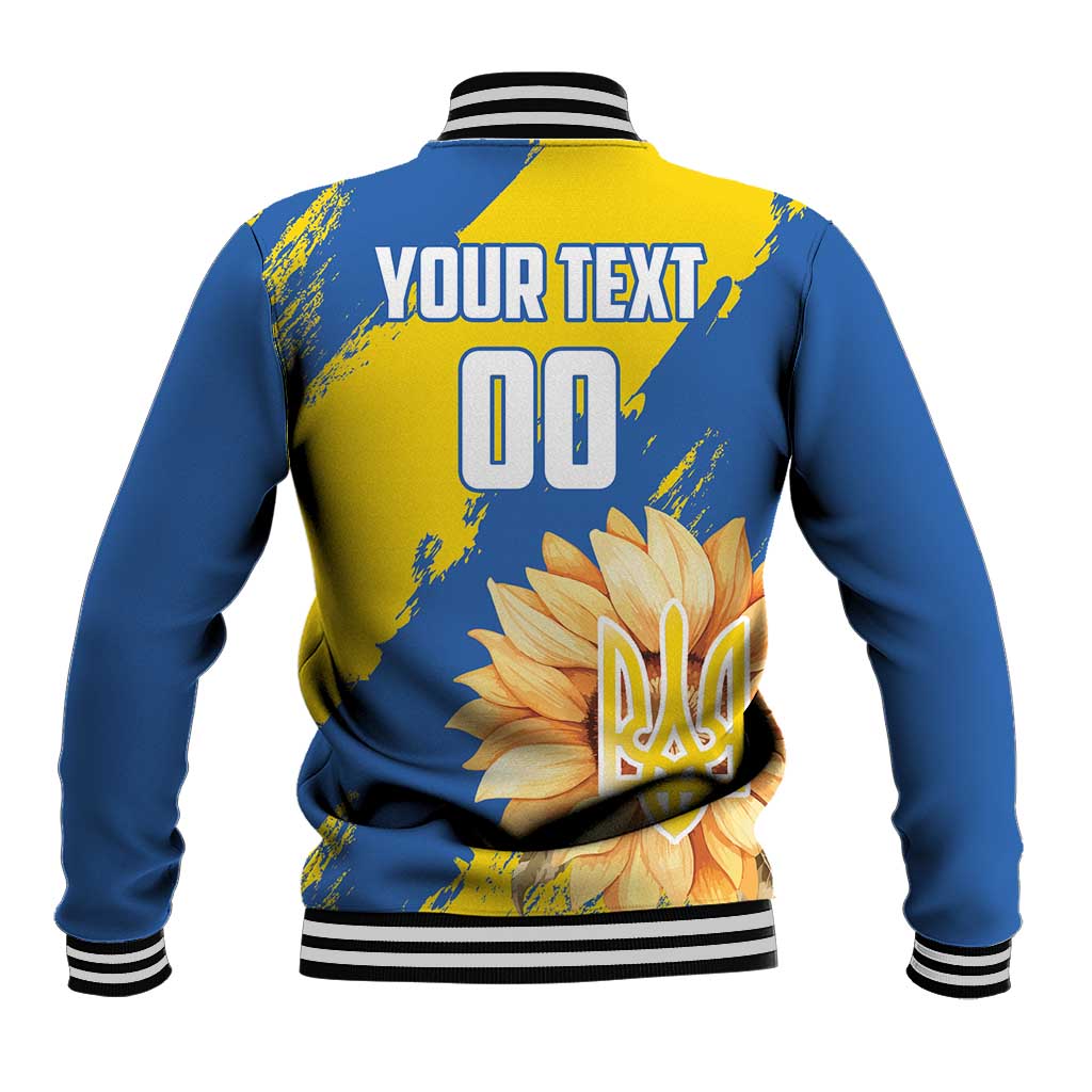 Blue baseball jacket with yellow back graphic, ribbed collar, button front, striped cuffs
