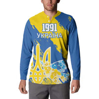 Blue and yellow button-front sweatshirt featuring 1991 UKRAINA text with dove/peace design