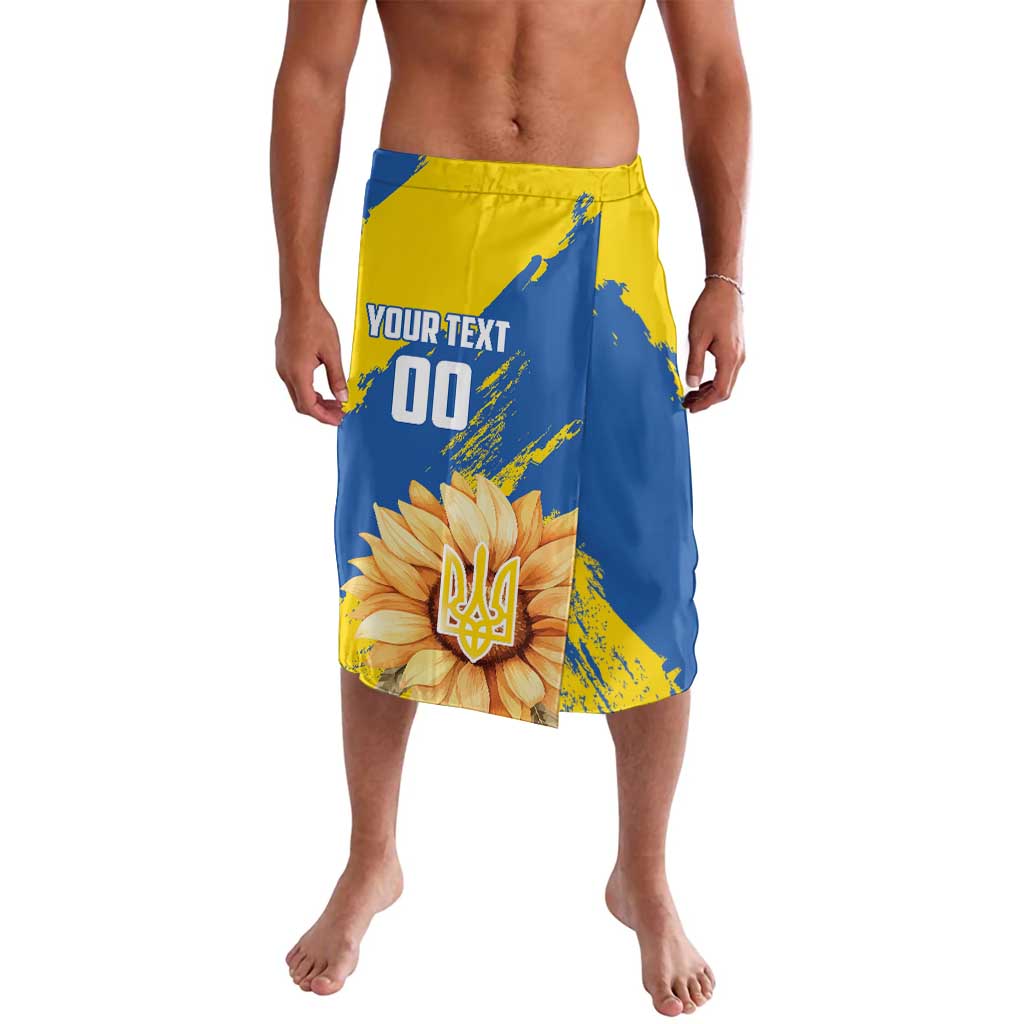Blue and yellow lavalava sarong with grunge print, trident flower and front text