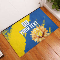 Blue and yellow grunge rubber doormat with '00 YOUR TEXT' and sunflower trident graphic