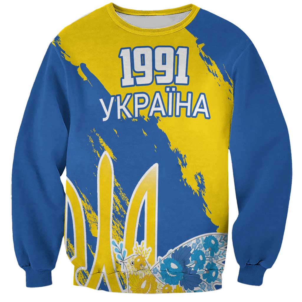Blue and yellow sweatshirt with 1991 UKRAINA print and dove motifs