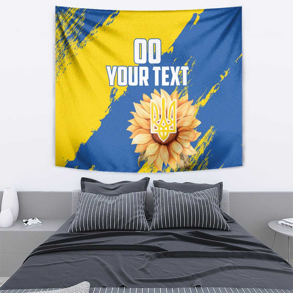 Blue and yellow hanging tapestry with flower emblem and bold custom text