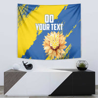 Blue and yellow wall tapestry with central flower emblem and custom text