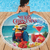 Round blue beach blanket with fringe, parrot and 'Merry Christmas' over deck