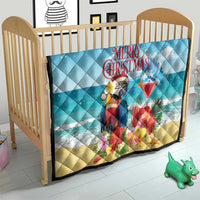 Blue Christmas quilt on a baby crib, featuring tropical parrot and rum punch cocktail