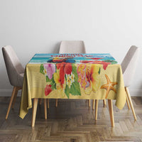 Tropical Christmas tablecloth on table with yellow floral panel and starfish print