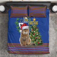 Blue Christmas bedding set with cat in red Santa hat and colorful folk border trim