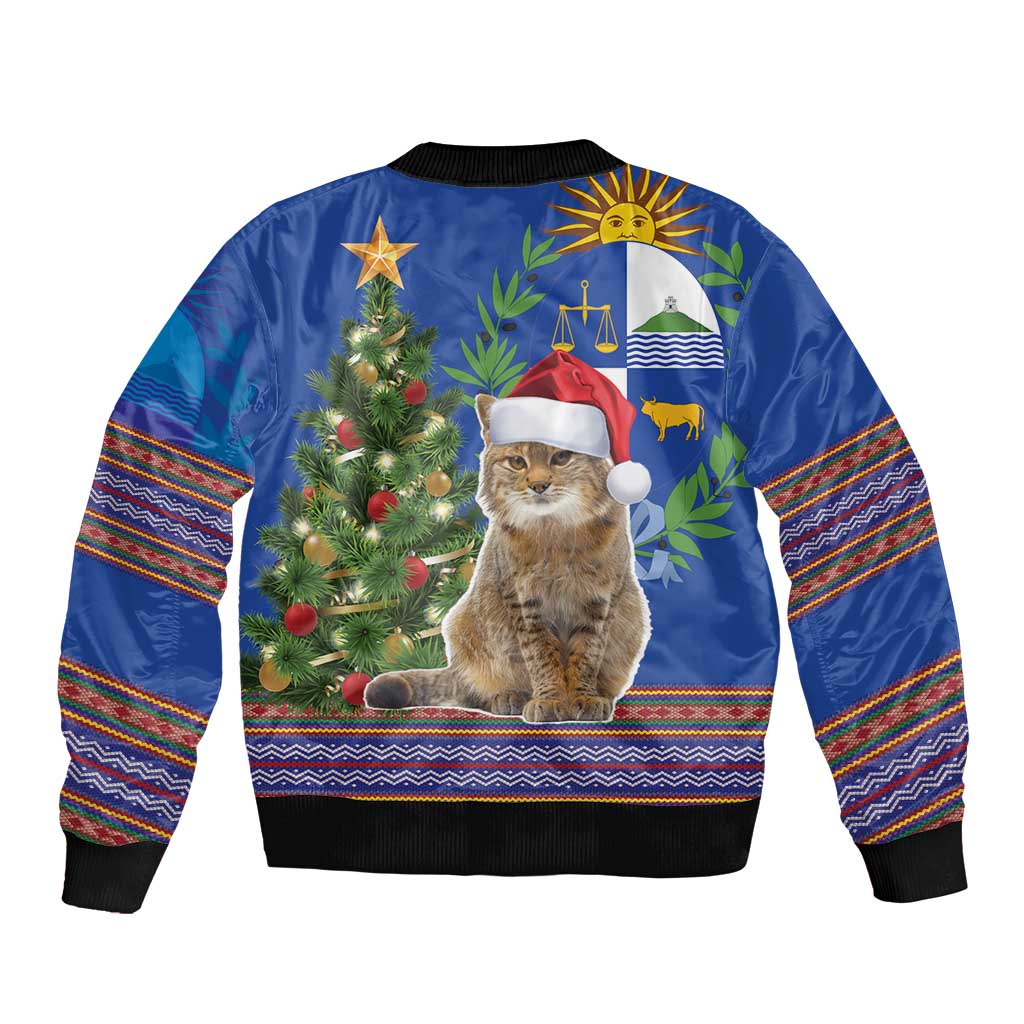 Unisex blue bomber jacket with rear graphic cat in Santa hat, Christmas tree and stripes