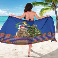 Blue Christmas cat sarong, rear view with Merry Christmas text and striped folk hem