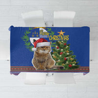 Blue Christmas tablecloth with cat wearing a Santa hat and folk border pattern