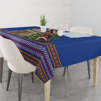 Blue Christmas tablecloth with multicolor folk zigzag stripes and hanging table edge