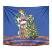 Blue Christmas tapestry close-up of cat in Santa hat with Christmas tree and border