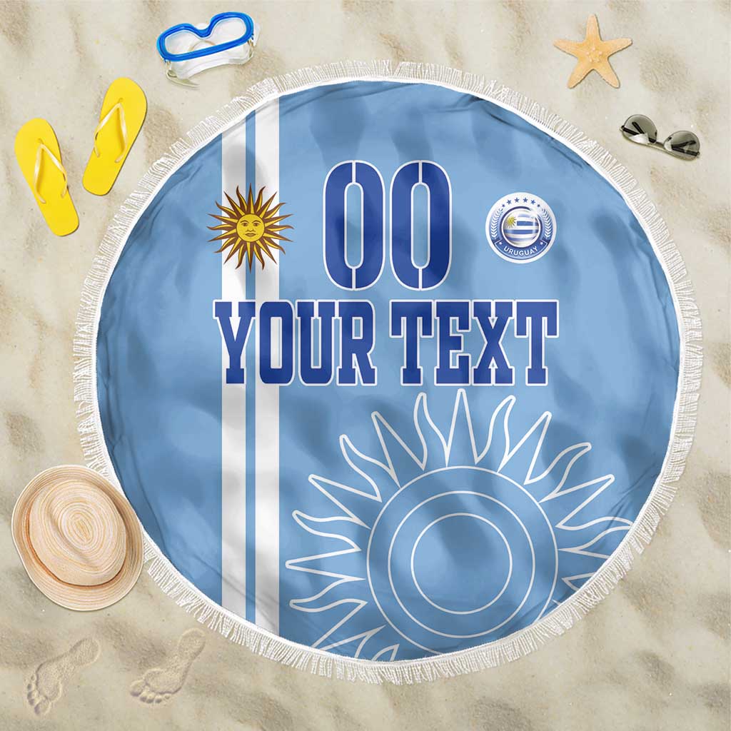 Blue round beach blanket with white fringe edge and custom “Your Text” graphic
