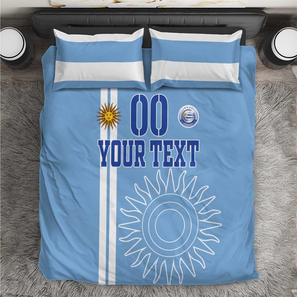 Blue bedding set with light-blue stripes, sun design, and custom text print