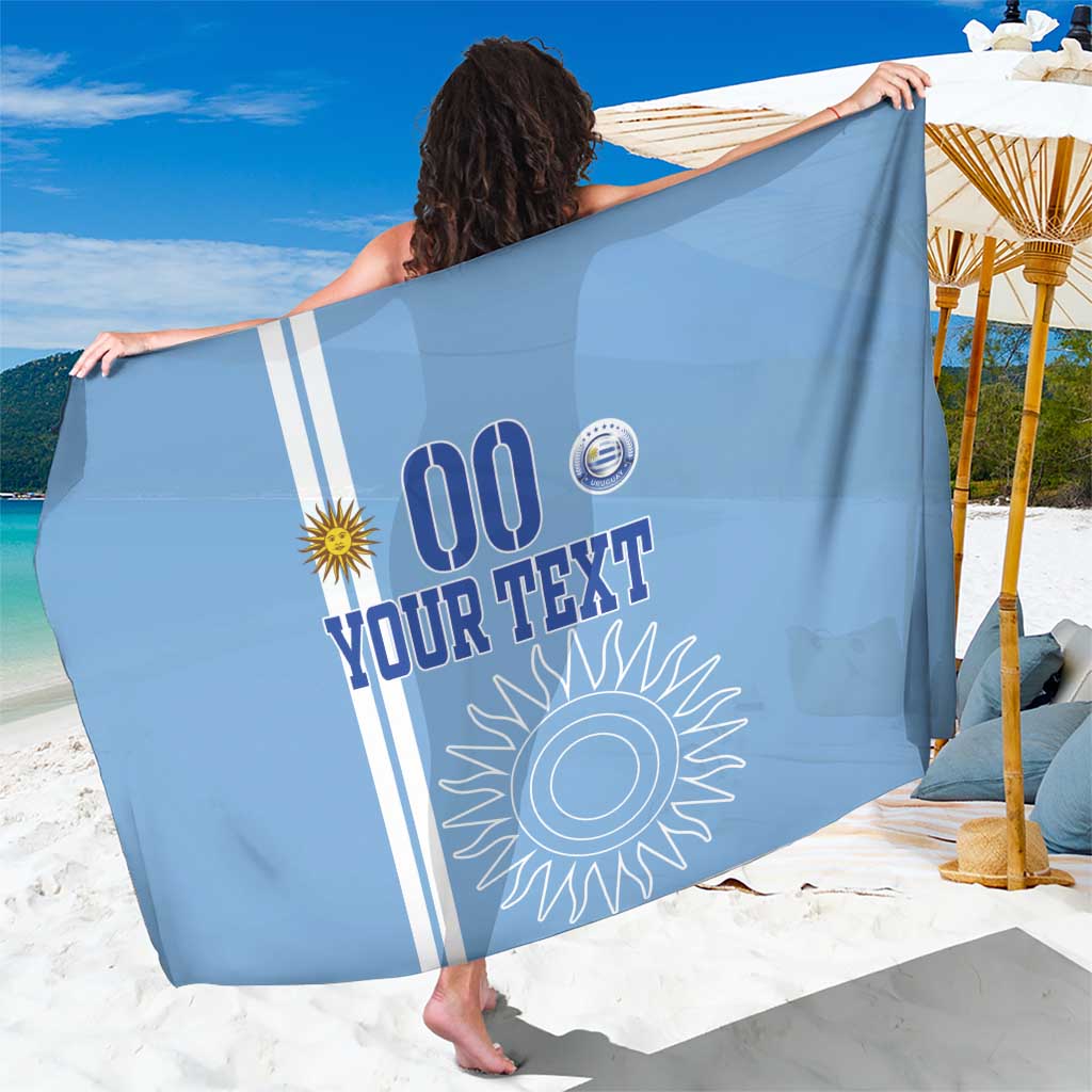 Sky blue football sarong with white stripes, sun graphics, and custom text