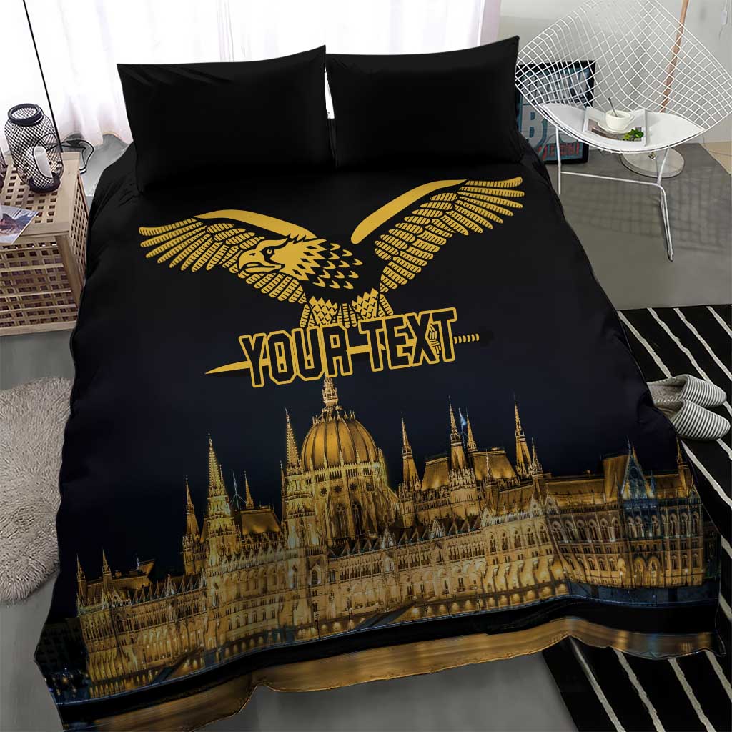 Black duvet cover featuring a gold winged bird emblem above a city skyline graphic