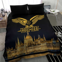 Black duvet cover featuring a gold winged bird emblem above a city skyline graphic