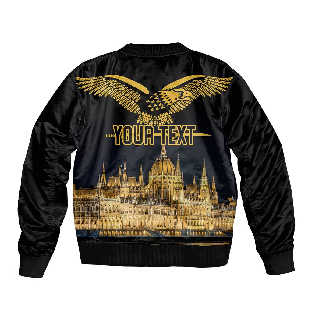 Black bomber jacket with gold winged bird on back, skyline and 'YOUR TEXT' design