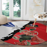 Round decorative rug with red and gray sections, black silhouette, star and floral art