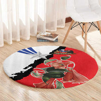 Round area rug with red base, gray corner, star emblem, and detailed floral figure