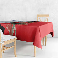 Red tablecloth draped over a table edge with Chile-inspired flag artwork