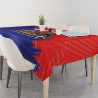 Red and blue Chile coat of arms tablecloth on dining table with chairs