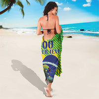 Brazil-themed sarong with green/yellow stripes and blue emblem; worn at waist
