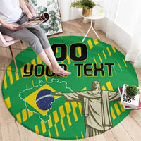 Round green rug viewed from above with Cristo Redentor and "YOUR TEXT" lettering.