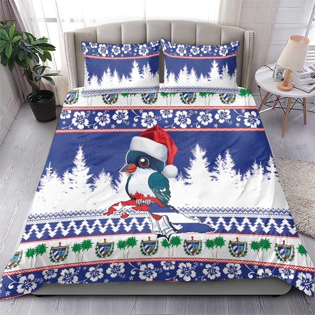 Blue holiday bedding set with duvet and two pillowcases, bird with Santa hat and pine pattern