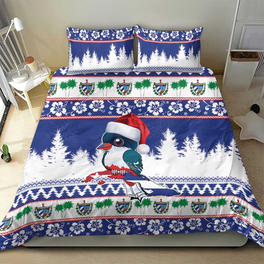 Blue holiday bedding set: duvet with bird in Santa hat, pine motifs, red/green holiday bands