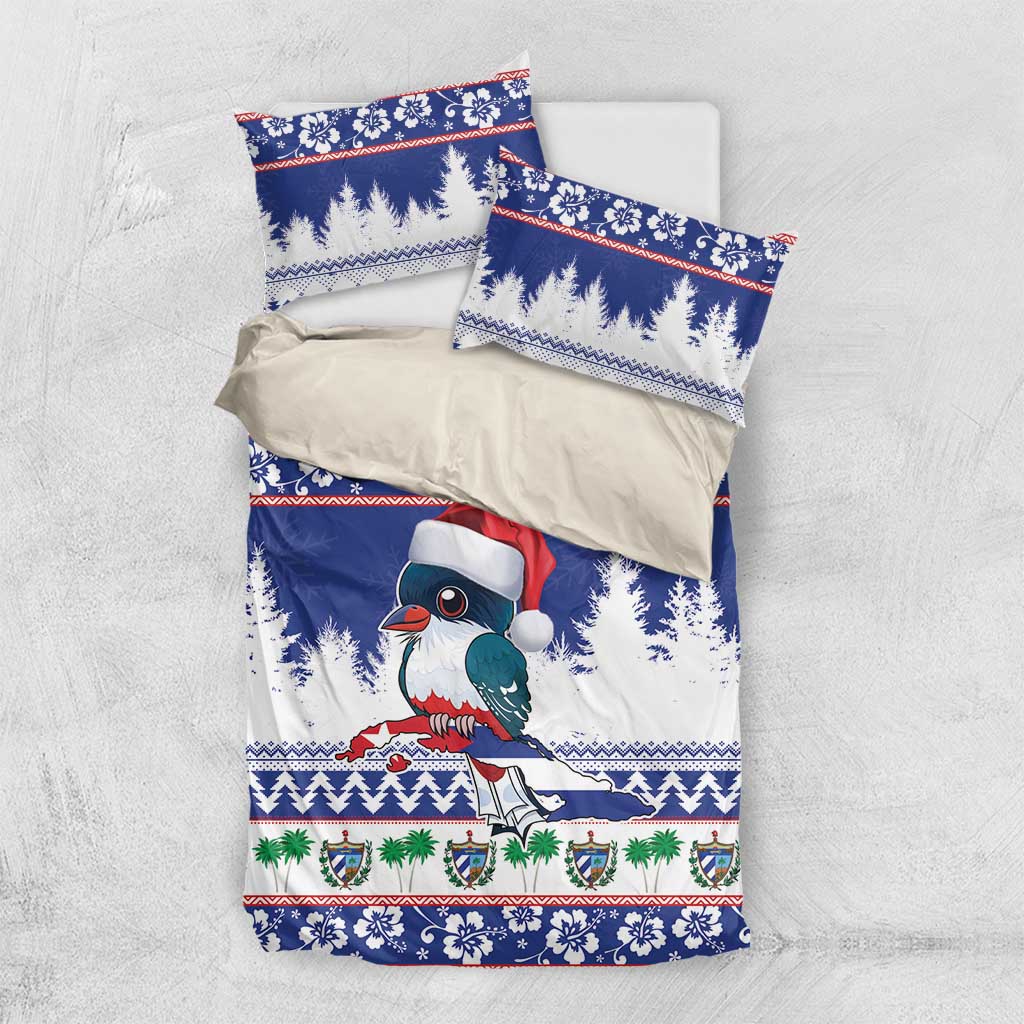 Blue duvet with bird in Santa hat and pine trees; two matching pillowcases