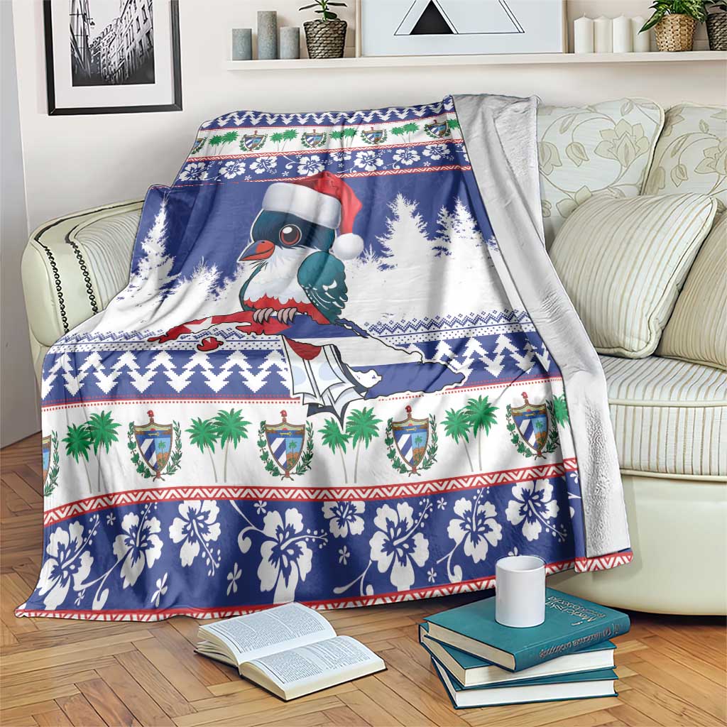 Blue Christmas throw blanket with toucan, Santa hat, snow trees and festive border