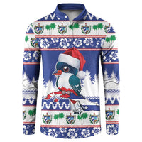Blue Christmas pullover sweatshirt with toucan graphic, palm trees, and holiday pattern