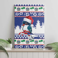 Blue Christmas canvas wall art featuring trogon bird in red Santa hat with winter pattern