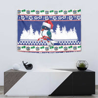 Blue Christmas bird tapestry with Santa-hat bird, snowy trees, and colorful patterned border