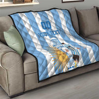 Argentina football quilt on sofa, blue-and-white diagonal stripes with custom text