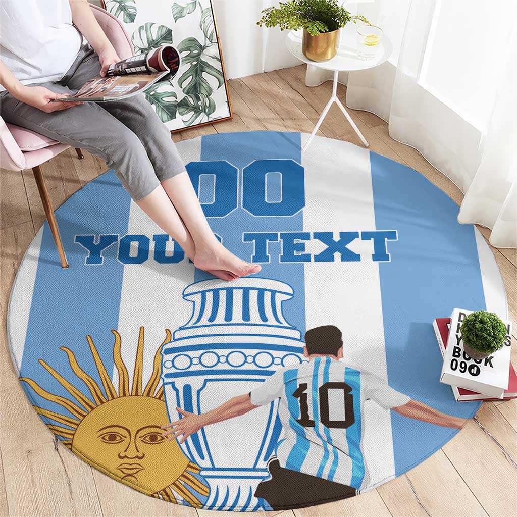 Round blue-and-white rug with custom text and illustrated sun face and Argentina figure artwork