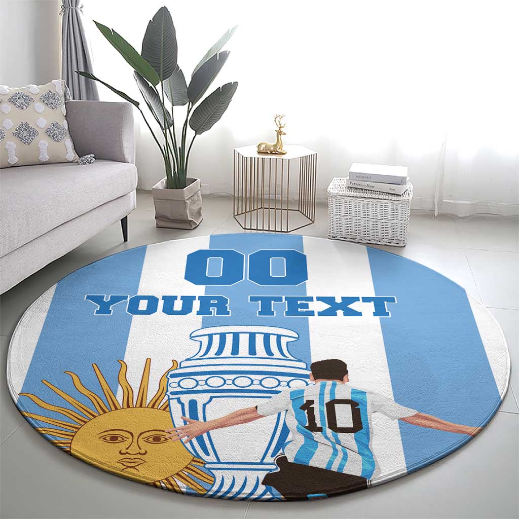 Round blue-and-white custom printed rug with large center text and sun-and-figure graphics